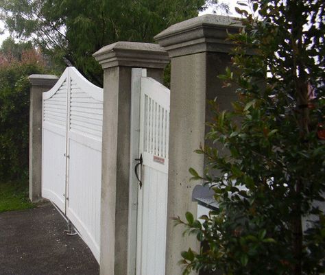 how to build wooden driveway gates and make concrete gate posts with decorative caps [THESE are the types of old concrete posts that would be good w/ the split rail fence. Possibly pit up while drying to make look weathered then spray with lichen milkshake?] Masonry Fence, Bi Folding Driveway Gates, Tall Driveway Gate, Driveway Gate Brick Columns, Uneven Split Driveway Gate, Gate Landscaping, Split Rail Fence Gate, Fence Building, Iron Gates Driveway