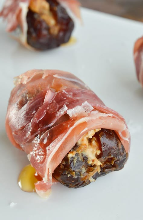 Prosciutto Wrapped Dates Stuffed with Goat Cheese and Fig Butter make the perfect hors d'oeuvres. Serve with a drizzle of honey and sprinkle of salt for the ultimate salty sweet appetizer recipe! Prosciutto Wrapped Dates, Dates With Goat Cheese, Goat Cheese And Prosciutto, Dates Stuffed, Fig Butter, Wrapped Dates, Salty Sweet Snacks, Sweet Appetizer, Impressive Appetizers