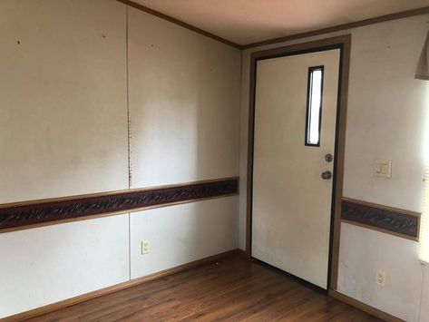 Fleetwood Double Wide Becomes Couple's First Home Mobile Home Living Room Ideas Doublewide, Double Wide Living Room Ideas, Doublewide Mobile Home Renovations, Mobile Home Front Door, Doublewide Remodel, Mobile Home Walls, Double Wide Trailer, Double Wide Remodel, Mobile Home Doors