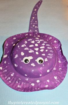 A few months ago we went to a fair while we were on vacation. My daughter became fascinated by the squirting race game that they had. She referred to it as “the contest”. We all played … Stingray Craft, Under The Sea Crafts, Sea Crafts, Vbs Crafts, Ocean Crafts, Paper Plate Crafts, Plate Crafts, Camping Crafts, Ocean Themes