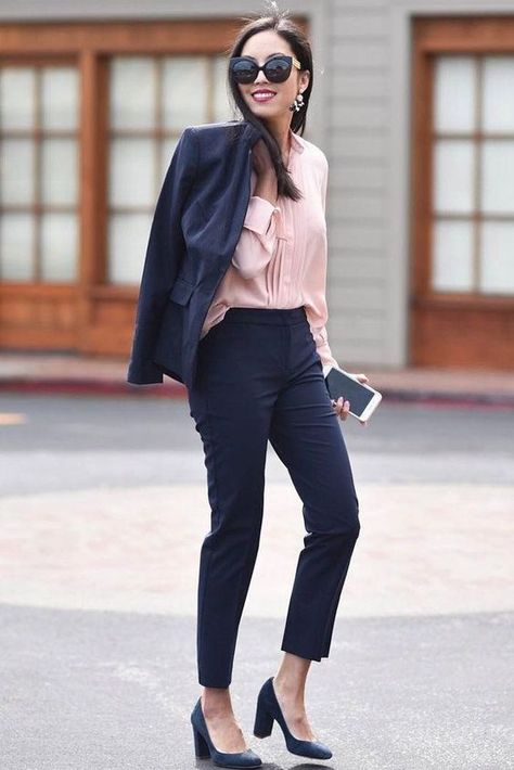 a navy pantsuit with cropped pants, a pink shirt and blue shoes for a professional look Navy Heels Outfit Work, Buissnes Smart Outfit, Black Pants Pink Top Outfit, Pink Shirt Black Pants Outfit, Navy Shoes Outfit, Navy Pants Outfit Work, Black Pants Outfit For Work, Professional Office Outfit, Fashionable Work Outfits