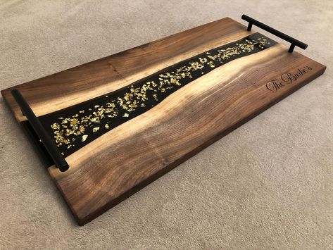 Gold Flake board with black epoxy background. Available in 18”x10” and 24”x12” Boards can be made with or without handles and we also offer laser engraving. DM to place your order today. #charcuterie #servingboard #charcuterieboard #weddinggift #giftideas #unique #quality #oneofakind #madeincanada #orangeville #ontario Wood Inlay Designs, Epoxy Charcuterie Board, Boxes Ideas, Woodwork Projects, Gold Flake, Wood Building, Black Walnut Wood, Resin Ideas, Black Handles