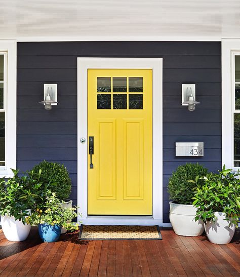 bright-yellow-door-blue-siding-213a0b87 Yellow Siding, Painted Exterior Doors, Blue Siding, Yellow Front Doors, Color Door, Yellow Door, Door Colors, Pintura Exterior, Yellow Doors