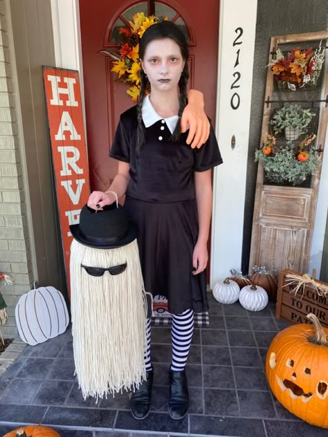 My daughter’s wednesday addams costume 2030 Wednesday Adam Costume Diy, Wednesday Addams Dress Up, Toddler Wednesday Addams Costume, Kostüm Wednesday Addams, Kids Wednesday Addams Costume, Wednesday Addams Couple Costume, Diy Wednesday Addams Costume Kids, Wednesday Adams Couple Costume, Wensday Costume Ideas