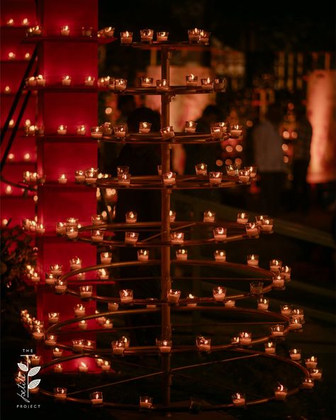 Hundreds of illuminating diyas and lights to bring our surreal Ganga Ghat to life ✨ The Wedding Shruti and Aakash Karjat Design, Decor and Flowers @thepetiteproject_ Executed With @shanijshabu Production @allattractiveevents #weddingdecor #weddingday #benarasghat #weddinginspiration #decorinspiration #artistsoninstagram #artistsofinstagram #floraldesign #floraldecor #decoraesthetic #decorideas #red #weddingday #eventstylist #gangaghat #gangaghat Garba Wedding Decor, Qawali Night Decor, Candle Reception Decor, Qawali Night, Ganga Ghat, Candles Reception, Udaipur Wedding, Garba Night, Diwali 2024