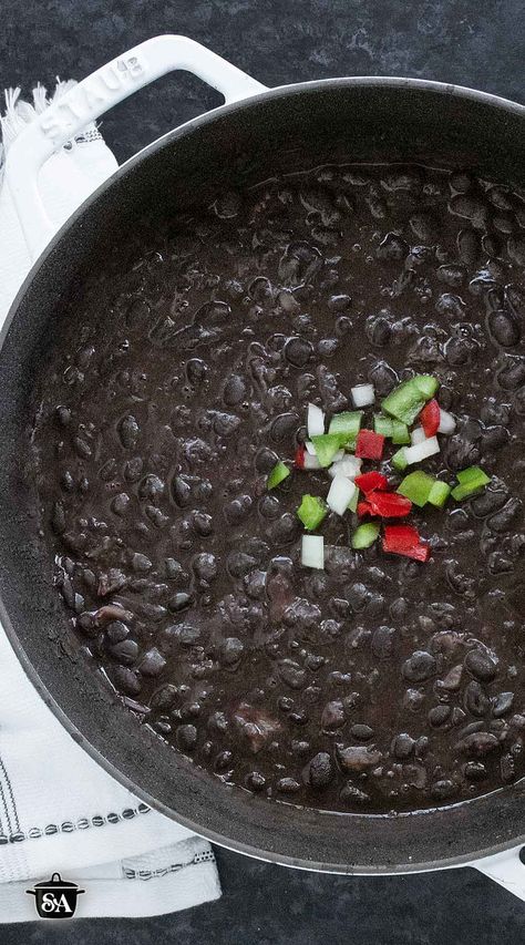 Addicted to hearty, flavorful soups like I am? This Cuban Black Bean Soup is made from scratch with dried beans, a smoky ham hock, and Cuban-inspired seasonings. It’s rich, filling, and freezes beautifully, so make a big batch! Get the recipe at SoupAddict.com. Beef And Black Bean Soup, Cuban Black Bean Soup, Ham Hock Soup, Recipes Using Beans, Cuban Black Beans, Dried Black Beans, Black Bean Recipes, Pork N Beans, Ham Hock