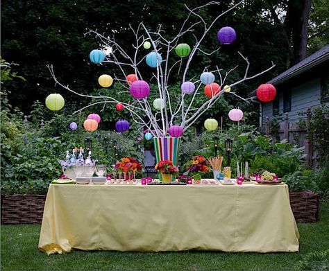 Michael Devine: For a summer drinks party, Michael fashioned a festive table with a centerpiece of colorful lit lanterns, cleverly fitted with LED battery votives. Backyard Party Decorations, Outdoors Birthday Party, Backyard Birthday, Outdoor Birthday, Garden Party Decorations, Outdoor Party Decorations, Garden Birthday, Deco Floral, Backyard Party