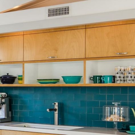 Heath Ceramics's Tile Feed on Instagram: "The striking blues of M40 Turquoise anchor this open kitchen/dining area with a solidly saturated backsplash.

Get M40 Turquoise in Classic Field 2x6 shipped and delivered as soon as this week, as part of our Ready-to-Ship tile program.

Featured:
Classic Field 4x4 and 4x8 in M40 Turquoise

Design: Grace Hilton
📷: @mcmenaminphoto" Heath Ceramics Tile, Turquoise Design, Heath Ceramics, Open Kitchen, Backsplash, Dining Area, Kitchen Dining, Tile, Turquoise