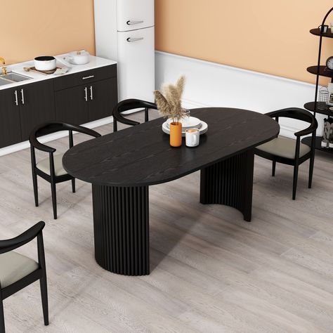 Elevate your dining experience with our exquisite Elliptical Black Dining Table. Crafted with sophistication in mind, this unique piece boasts a textural black tabletop, perfectly complemented by its double pedestal wooden base. Wood Oval Dining Table, Oval Kitchen Table, Modern Oval Dining Table, Black Wood Dining Table, Oval Dining Room Table, Black Dining Table, Christmas Dining Table Decor, Home Goods Furniture, Christmas Dining Table