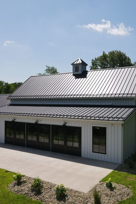 Board and Batten Steel Siding pairs the beautiful aesthetic of traditional siding with the strength and durability of steel. Board And Batten Metal Building, Metal Board And Batten Siding, Board And Batten Shed, Vertical Metal Siding, Hangar Home, Metal Pole Barns, Farmhouse Sheds, Metal Garage Buildings, Granny House