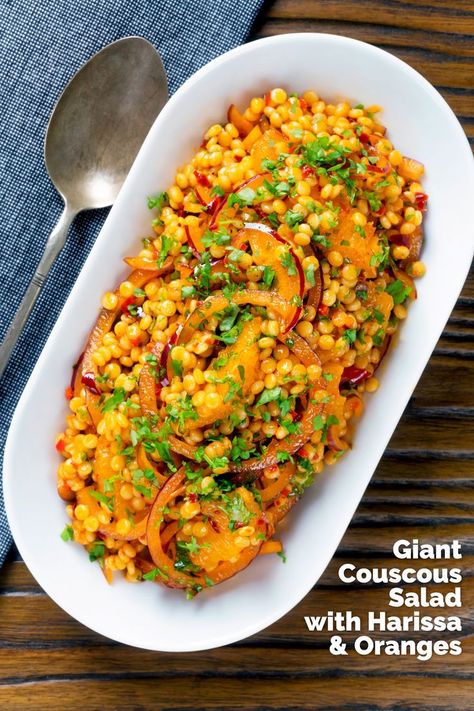 Giant couscous salad with rose harissa paste, orange & red onion is a wonderfully versatile and quick side dish that will brighten any plate. Preparation for this dish takes a relatively leisurely 15 minutes and cooking takes less than 10 minutes, it is great with everything from roasted meats to vegetables and fish! Giant Couscous, Salad With Oranges, Quick Stir Fry Recipes, Pearl Couscous Salad, Rose Harissa, Quick Side Dish, Pearl Couscous, Harissa Paste, Quick Side Dishes