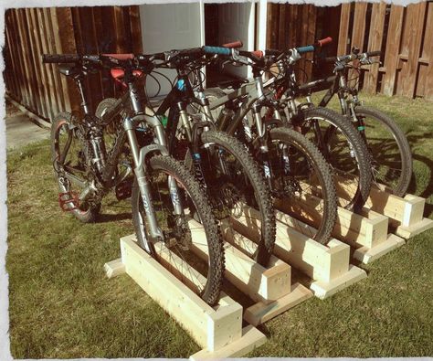 Scrap Wood Bike Stand (self Supporting): This simple Scrap Wood Bike Stand was designed to organize the ever growing number of bikes in our shed. We needed flexibility in where the stands were placed, individually or grouped, and wanted to be able to use smaller pieces of wood to take ad... Wood Bike Rack, Rack Velo, Diy Bike Rack, Bike Hooks, Wood Bike, Bike Storage Rack, Woodworking For Kids, Bike Stand, Bike Shed