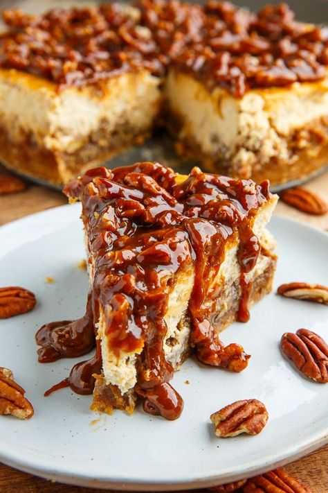 Pecan Pie Cheesecake with Pecan Caramel Sauce Pecan Praline Cheesecake, Pecan Caramel Sauce, Caramel Pecan Topping, Basic Cheesecake Recipe, Basic Cheesecake, Caramel Pecan Cheesecake, Caramel Sauce Recipe, Two Layer Cakes, Pecan Pie Cheesecake