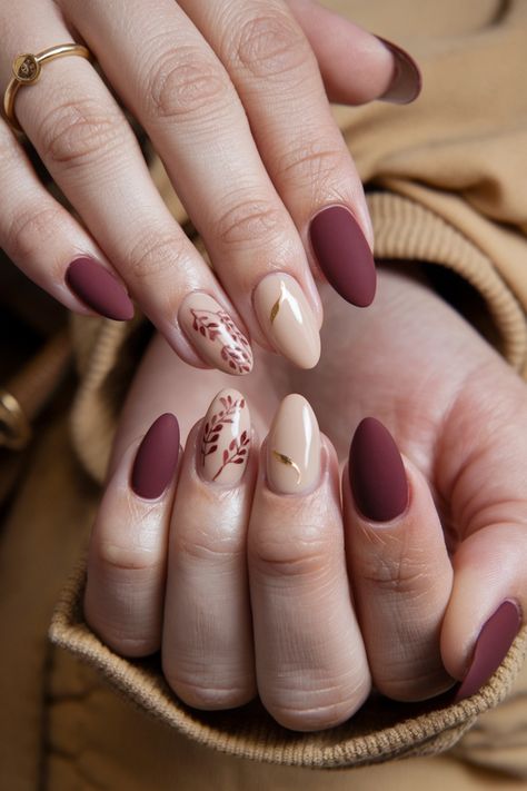 Embrace the season with these charming fall nail ideas designed for your natural nails. Picture warm, earthy tones like deep burgundy and mustard yellow, creatively swirled together for a cozy aesthetic. Add a hint of delicate gold sparkles to elevate your look, capturing the essence of autumn leaves. This style is perfect for anyone who wants a subtle yet striking way to celebrate the season. Get inspired and bring autumn to your fingertips! Burgundy Bridal Nails Wedding, November Nails Matte, Simple Pattern Nails, Crimson Nail Designs, Fall Bride Nails, Fall Inspired Nails Autumn, Unique Bridal Nails, Fall Wedding Nails For Guest, Fall Wedding Nails Bridesmaid