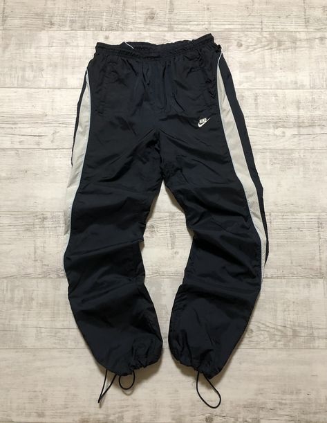 Nike Vintage Y2K Nike Nylon Drill Black Track Pants | Grailed Nike Track Pants Outfits, Nike Vintage Track Pants, Vintage Track Pants, Nike Wear, Track Pants Outfit, Black Track Pants, Pants Outfit Men, Nike Track Pants, Men's Bottoms