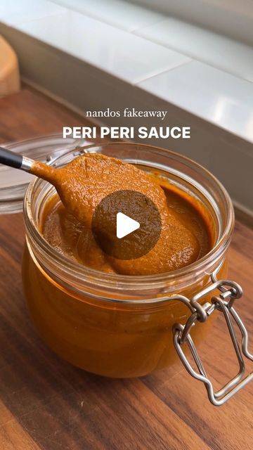 Serena Patel | Food & Travel Content Creator on Instagram: "Homemade Nandos Style Peri Peri Sauce Recipe 🌶️🥵 This is easy to make, stores well in the fridge & is great for adding to chicken & spicy rice! Save the recipe below!

🔸 Ingredients:
1 large red onion
1 large red bell pepper
2 sweet pointed red peppers
1 large bulb of garlic
3 birds eye chillies (more if you want it HOT)
2tbsp tomato puree
Large handful of fresh parsley (10g)
Large handful of fresh basil (15g)
Juice from 1 lemon
Zest from 1 lemon 
2tbsp red wine vinegar
1tbsp honey
2tbsp smoked paprika
1tbsp garlic granules
2tbsp dried thyme
2tbsp dried oregano
1tsp ground black pepper
1tbsp salt
100ml water to start & more as needed
2tbsp extra virgin olive oil

1️⃣ Chop the peppers & onion into large chunks & add to a small r Homemade Nandos, Peri Peri Sauce Recipe, Peri Peri Sauce, Spicy Rice, Tomato Puree, Red Pepper Sauce, Dried Thyme, Peri Peri, Travel Content