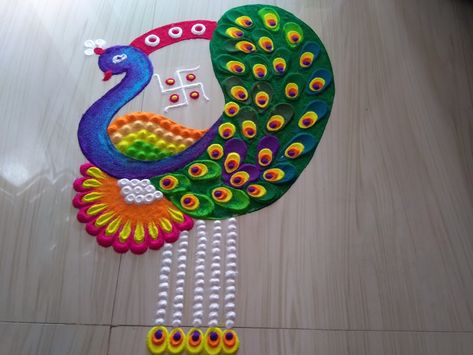 Shiddis rangoli art Peacock Simple Rangoli, Rangoli Designs Of Peacock, Peacock Small Rangoli, Diwali Special Rangoli Design Peacock, Very Easy Rangoli Designs Peacock, Peacock Rangoli, Rangoli Colours, Diwali Festival Of Lights, Muggulu Design