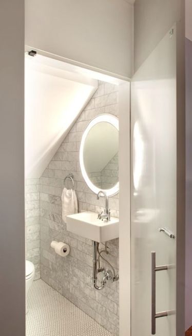 Simple and elegant Understairs Toilet, Lavabo D Angle, Stairs Bathroom, Bathroom Under Stairs, Bathroom Lighting Design, Attic Renovation Ideas, Small Space Bathroom, Under The Stairs, Modern Bathroom Lighting