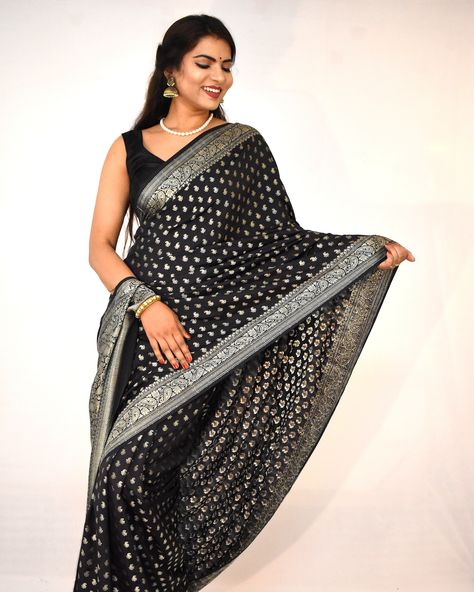 Magnificent Black Banarasi saree with silver butti and zari work 🖤 For more queries and booking please DM or contact us on +91 9714 82 8762 with screenshot. . . . . . . . . [Banarasi silk, Indian Craftsmenship, saree online, Indian ethnic, Indian wear, Ethnic wear] #stylinginspirations #banarasisaree #womenwear #indianwear #ethnicwear#festivevibes #festives2024 #indianfestivewear #silksarees #sareelover #sareeonline #silksofindia #indianfashion #fashioninspo #kaashvi #thekaashvi #reels #re... Black Banarasi Saree, Ethnic Indian Wear, Banarasi Saree, Zari Work, Saree Online, Banarasi Sarees, Ethnic Wear, Sarees Online, Indian Wear