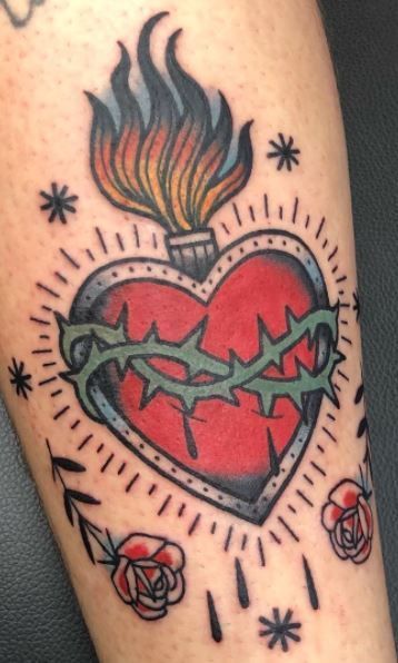 << Check out more Sacred Heart Tattoos and Ideas #tattoomenow #tattooideas #tattoodesigns #tattoos #divine #sacredheart #christian #religious #immaculateheart #traditional Burning Heart Tattoo Traditional, Trad Sacred Heart Tattoo, Sacred Heart Tattoo Color, American Traditional Sacred Heart Tattoo, Sacred Heart Tattoo Traditional, American Traditional Heart Tattoo, Traditional Sacred Heart Tattoo, Mexican Heart Tattoo, Traditional Heart Tattoo