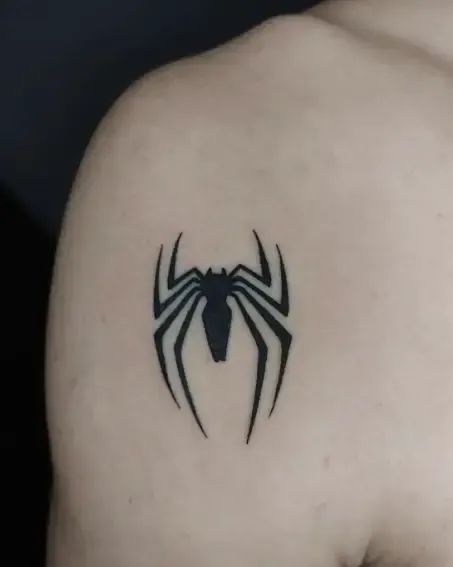 In need of some web-slinging inspiration? Look no further! Find over 130 amazing Spiderman tattoo ideas here that are sure to make you feel like a superhero. #SpidermanTattoo #TattooIdeas #SuperheroInspiration Spiderman Simple Tattoo, Small Spiderman Tattoo Simple, Spiderman Web Tattoo, Spiderman Henna, Tattoo Designs Spiderman, Simple Spider Tattoo, Spiderman Symbol Tattoo, Tattoo Ideas Spiderman, Small Spiderman Tattoo