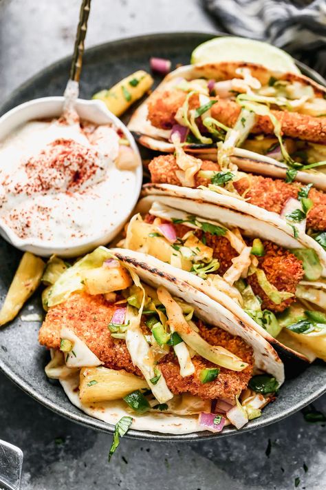 Crispy Air Fryer Fish Tacos with Pineapple Slaw - Cooking for Keeps Breaded Fish Tacos, Crispy Air Fryer Fish, Air Fryer Fish Tacos, Pineapple Slaw, Breaded Fish, Tacos With Pineapple, Air Fryer Fish Recipes, Air Fryer Fish, Japanese Sweet Potato