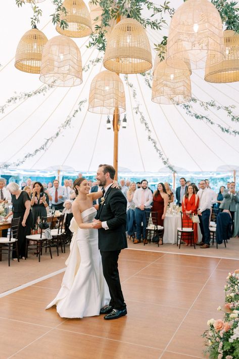 Decor for summer tented wedding with greenery and rattan lanterns. Bride and groom first dance during summer wedding at Willowdale Estate. Photography By Halie, Boston and New England Wedding Photographer. Lanterns Over Dance Floor, Rattan Chandelier Wedding, Rattan Lantern Wedding, Wedding Lantern Decor Reception Ideas, Wedding Rattan, Rattan Wedding, Wedding With Greenery, Rattan Lantern, Willowdale Estate