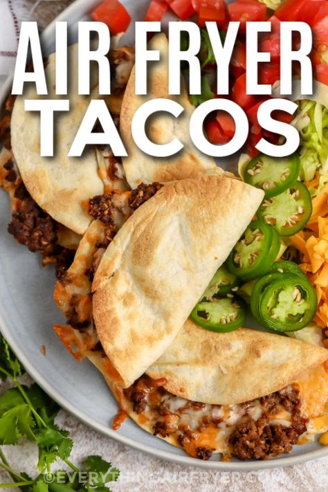 a plate of prepared Air Fryer Tacos with a title Corn Tortilla Air Fryer Recipes, Tortillas In The Air Fryer, Air Fryer Recipes Peppers, Flour Tortillas In Air Fryer, Air Fried Tacos Recipe, Air Fryer Fried Tacos, Taco In Air Fryer, Healthy Homemade Tacos, Air Fryer Big Mac Tacos