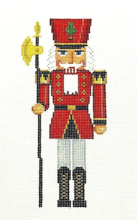 The Red Guard Nutcracker handpainted Needlepoint Ornament by Susan Roberts The Red Guard Nutcracker handpainted Needlepoint Ornament by Susan Roberts Click image to enlarge Description Welcome to  Needlepoint By Wildflowers!  My goal is to offer you the best possible service, the finest hand painted needlepoint canvases, beautiful needlepoint accessories, stitching supplies and the best professional service.  Offered is a Brand New needlepoint Ornament canvas from Susan Roberts Needlepoint ~ A beautiful, very detailed Nutcracker ~ " The Red Guard Nutcracker Holding his Ax " ... hand painted on 18 mesh mono canvas. The stitch painted canvas area is  7.75" by  3.15" with surrounding background canvas of approximately 11.5" by 7.5".    Perfect for an Ornament by would be a lovely pillow inser Red Guard, Needlepoint Accessories, Needlepoint Ornaments, Cross Stitch Books, Needlepoint Christmas, Cross Stitch Samplers, Cross Patterns, Counted Cross Stitch Kits, Christmas Cross