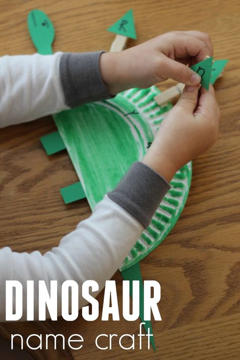 Toddler Approved!: Paper Plate Dinosaur Name Craft Dinosaur Name Craft, Paper Plate Dinosaur Craft, Shape Games For Kids, Paper Plate Dinosaur, Dinosaur Crafts Preschool, Dino Craft, Preschool Dinosaurs, Dinosaur Preschool, Dinosaur Lesson