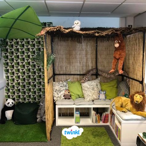 🦁🍃 Jungle-themed reading corner 🍃🐼 Children will be wild about reading with this stunning reading corner, complete with an orangutan, panda, and lion.   Why not create your own rainforest reading corner with our ready-made display pack? Click to download from the Twinkl website 🦁🐼   #reading #readingcorner #readingarea #jungle #junglethemedclassroom #rainforestclassroom #teachingideas #teachingresources #classroomideas #classroomreadingcorner #twinkl #twinklresources #rainforest Kindergarten Reading Corner, Classroom Reading Nook, Rainforest Classroom, Wild About Reading, Reading Corner Kids, Reading Corner Classroom, Classroom Display Ideas, Reception Classroom, Jungle Theme Classroom