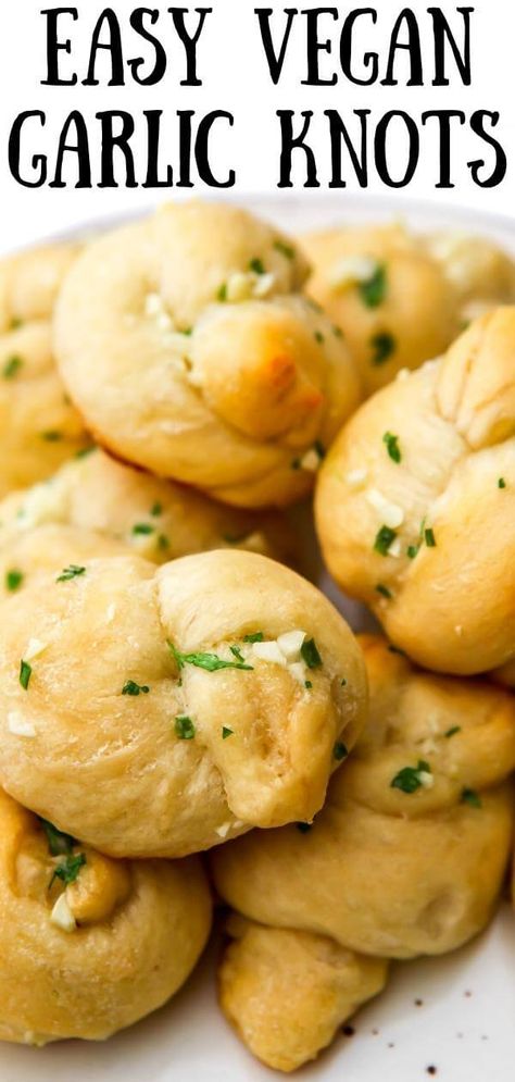 These easy vegan garlic knots are the perfect addition to any meal! Made quick and easy from pizza dough and vegan garlic butter, these warm buttery creations bake up in minutes and are packed with flavor. Vegan Garlic Knots Recipe, Vegan Dough Recipe, Vegan Garlic Knots, Vegan Garlic Butter, Vegan Garlic Bread, Garlic Butter For Bread, Challah Bread Recipes, Garlic Bread Pizza, Vegan Breads