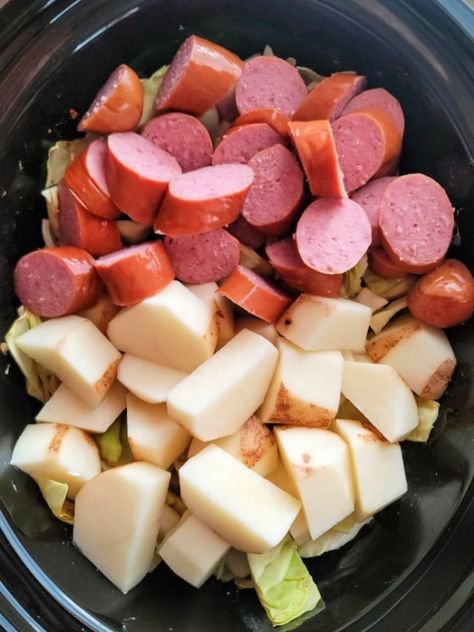 This recipe for Slow Cooker Kielbasa with Cabbage and Potatoes is hearty and delicious. Cabbage, kielbasa, and chunks of potatoes cooked low and slow in broth until everything is tender and flavorful