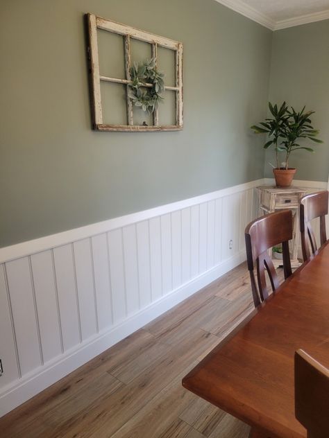 Green Panneling Rooms, Painted Half Wood Paneling Walls, Wallpaper And Chair Rail Dining Room, Green Half Panel Wall, 2 Tone Wall Paint Ideas Dining Room, White Panelling Green Walls, White Half Wall Paneling, Kitchen Paneling Wall, Boho Wainscoting Ideas