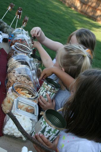 So CUTE for the kids! Trail Mix Bar - Kid's grab a can and make their own trail mix Trail Mix Buffet, Trail Mix Bars, Trail Mix Bar, Camping Party Decorations, Glamping Party, Camping Birthday Party, Camping Parties, Camping Birthday, Camping Party