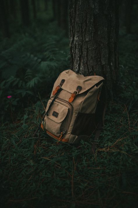 A backpack sitting in the grass next to a tree photo – Free Grey Image on Unsplash Backpack Product Photography, Bagpack Outfit Style, Backpack Photography, Book Vibes, Hd Dark Wallpapers, Inktober 2024, Ad Photography, Tree Photo, Grey Bag