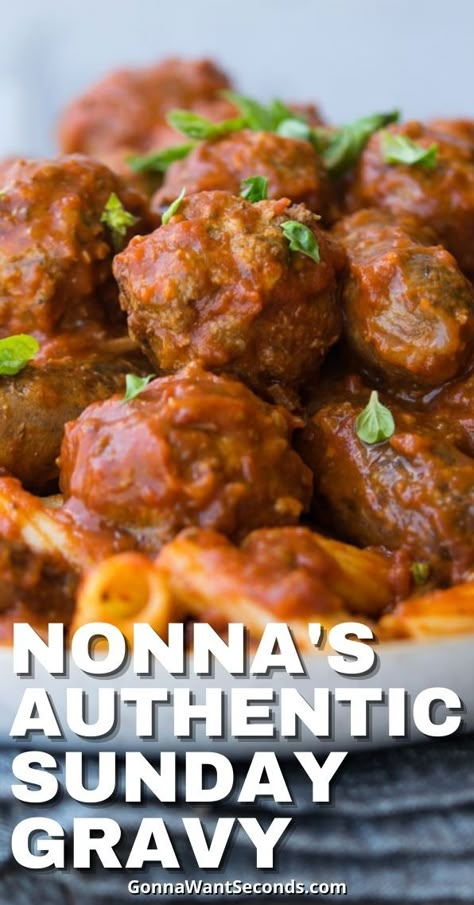 *NEW* Italian Sunday Gravy will get your family to the table like nothing else. Rich, hearty tomato sauce spiked with wine, succulent cuts of pork and meatballs. #SpaghettiSauce #ItalianFood #ItalianSundayGravy #SundayGravy #TomatoSauce #GrandmasRecipe #Meatballs #Pasta Italian Meat Sauce Sunday Gravy, Sunday Italian Gravy, Meatballs And Tomato Gravy, Italian Sunday Sauce, Italian Meatballs And Gravy, Sunday Gravy Authentic, Italian Sunday Gravy, Italian Gravy Authentic, Sunday Sauce And Meatballs