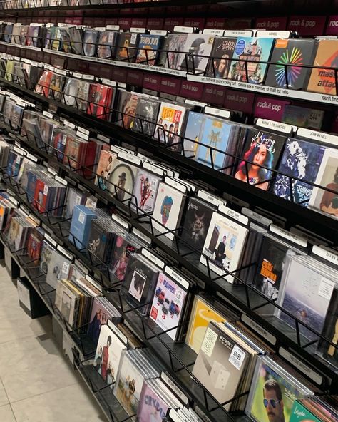 many different albums of music on a wall on shelves/racks in the shop HMV some include Freddie Mercury, Melanie Martinez and Arctic Monkies Cd Collection Aesthetic, Cds Aesthetic, Cd Store, Cd Aesthetic, John Mayall, Physical Media, Record Stores, Street Style Aesthetic, Cd Music