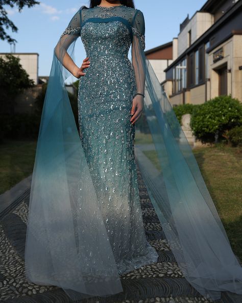 SS204 Ombre Turquoise Crystal Mermaid Dubai Evening Dress with Cape Sleeve 🌼 US size 6-18 Ready to Ship Check the homepage to see more dress designs. WhatsApp: +86 189 0682 5543 #فساتين_سهره #wedding #düğün #couture #eveningdress #sharonsaid #dress #fashion #style #ootd #eveningwear #love#dressoftheday #wholesale #retail #lebanon #turkey #qatar #worldwide #couture #evening #gown #blue #flower #model #blogger Evening Gown With Cape, Dresses With Cape Sleeves, Gown Making, Custom Flower Girl Dress, Dubai Evening, Gown With Cape, Crystal Mermaid, Yellow Evening Dresses, Silver Evening Dress