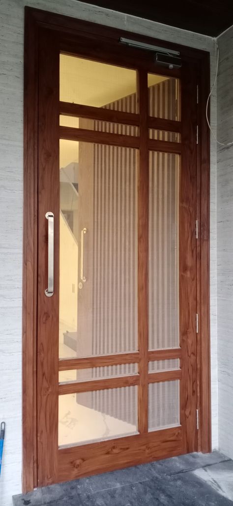 Front Door Net Design, Wooden Main Door Jalli Design, Single Net Door Design, Main Door Jalli, Modern Wooden Doors Jali, Main Door Net Design, Wood Net Door Design, Wooden Sefty Door Design Entrance, Door Net Design Modern