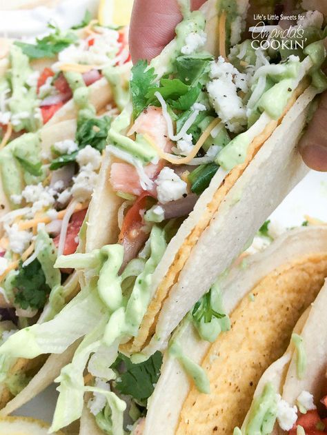 These Salmon Tacos are topped with homemade salsa and avocado sauce and accented with fresh cilantro. These tasty fish tacos are perfect for a crowd! Cilantro Avocado Sauce, Salmon Tacos, Lemon Salmon, Avocado Sauce, Side Dishes For Bbq, Fresh Salsa, Homemade Salsa, Fish Tacos, Baked Salmon