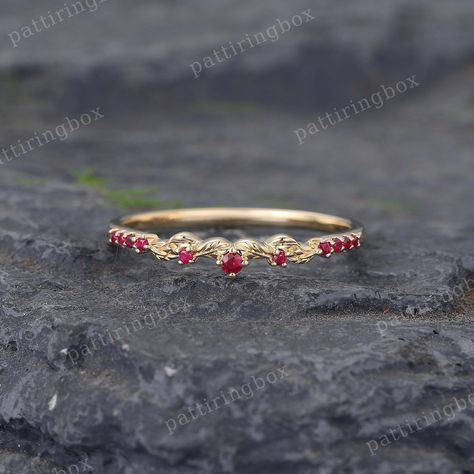 Unique Ruby Filigree wedding band 14k Yellow gold Vintage wedding band Dainty Art deco Leaf Matching Stacking band Promise Anniversary band ◆RING DETAILS: Stone: Natural Ruby Shape: Round cut Stone weight: About 0.08ct ◆Band Width:1.3mm ◆Band Thickness:1.2mm All ring sizes are available, If you can't find your ring size in the list, please feel free to contact me. Metal Choice: 14K/18K Yellow Gold, White Gold, Rose Gold are available. Other Metals and Gemstones are also available, Please feel free to contact me. ◆Production&Shipping: Rings making usually take 2 to 3 weeks and 3 to 5 days for domestic shipping ( 4-6 days for international shipping) If you want to receive the ring by the specified date, please contact me! After the rings ship, I will notify you and offer the tracking number. Gold Vintage Wedding, Filigree Wedding Band, Rings Making, Ruby Wedding Band, Stacking Bands, Vintage Wedding Band, Anniversary Bands, Ring Sizes, Natural Ruby