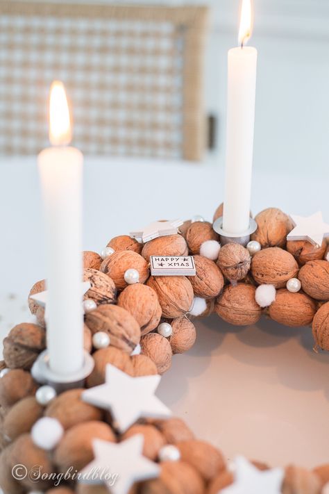 See how easy it is to turn your fall nut wreath into a walnut wreath Christmas centerpiece that will look good on your Thanksgiving table too. I love this unique holiday decor that lasts from Thanksgiving to Christmas. And it is so simple to make. Walnut Christmas Decorations, Walnut Wreath, Nut Wreath, Walnut Crafts, Advent Decorations, Wreath Centerpiece, Diy Christmas Decorations For Home, Unique Holiday Decor, Wreath Wall Decor