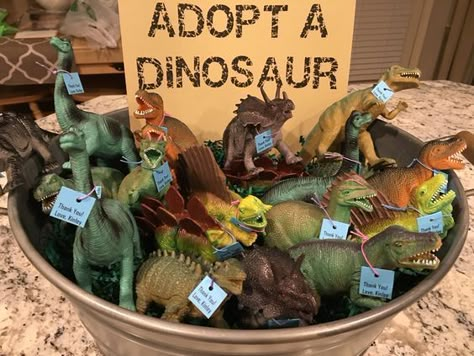 Adopt A Dinosaur Party Favor Idea | Dinosaur Birthday Party Ideas Jurassic Park Birthday Party, 4de Verjaardag, Dinosaur Birthday Theme, Birthday Party At Park, Jurassic Park Birthday, Dinosaur Birthday Party Decorations, Dinosaur Party Favors, Dinosaur Themed Birthday Party, Park Birthday