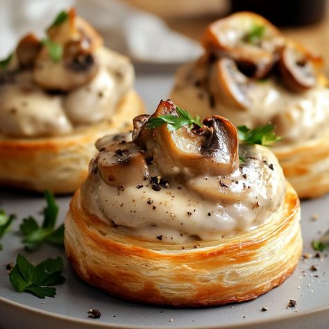 ✨🥐 Chicken and Mushroom Vol-au-Vent Recipe 🥐✨ Today, I offer you a delicious Chicken and Mushroom Vol-au-Vent recipe! Perfect to impress your guests at a dinner party or simply to enjoy with family! 😍🍽️ Ingredients: 4 vol-au-vent bases 300 g chicken breast 200 g button mushrooms 1 onion 20 cl crème fraîche 1 tablespoon flour 1 tablespoon butter Salt and pepper Parsley (for decoration) Instructions: Preheat the oven to 180°C (thermostat 6). In a frying pan, melt the butter and fry the chop... Starter Recipes Dinner Party, Chicken Vol Au Vent Recipe, Individual Party Food Ideas, Mushroom Vol Au Vent, Starters For Dinner Party, Chicken Vol Au Vent, Starters Recipes Dinner Party, Christmas Dinner Starters, Party Food Catering