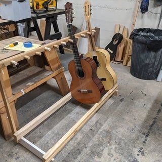 Under Steps Storage, Multiple Guitar Stand, Diy Guitar Stand, Wood Guitar Stand, Wooden Guitar Stand, Guitar Storage, Music Space, Guitar Rack, Music Rooms