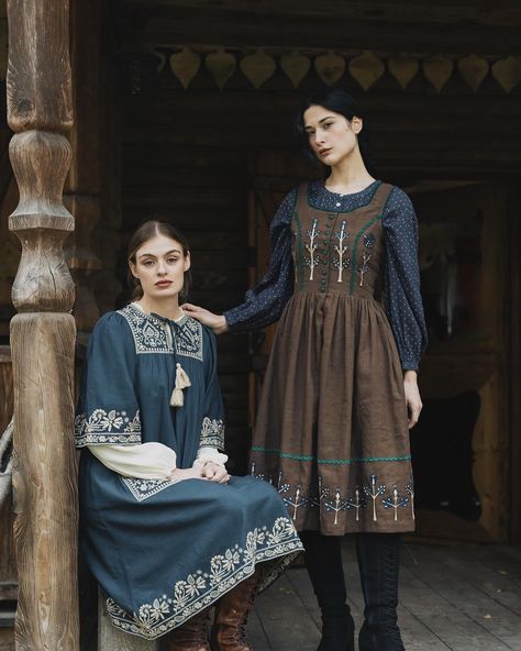 As you got lost in the forest, two sisters warmly welcome you in their house deep in the woods. What do you think will happen next? 🌲🍂 👩🏼 : @zelieallemoz, wearing the Deft blue “Mila” dress with the cream “Ziema” top. 👩🏻 : @violette.roseliere, wearing the brown “Tilda ” dress with the night blue “Mara” blouse. . . . . #cottagecoreaesthetic #ethicalbrand #cottagecore #darkhobbitcore #wicca #vintagecore #darkcottagecore #sustainablefashion #darkacademia #ethicalfashion #ethicallymade #ethicall... Norwegian Dress, Clothes Lookbook, Mila Dress, Lost In The Forest, Deep In The Woods, Modest Women, Dress Cottagecore, Paris Shopping, Cottage Core Aesthetic