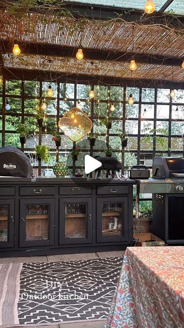 Pandora Maxton on Instagram: "It’s been a long week. A lovely bbq ( first this year) and a surprise sky spectacle made a lovely Friday evening. I have had this old sideboard for about 20 years and for the last few it’s lived outside. @james_at_the_meadows had the idea of making it our outdoor kitchen and what a good idea it was 👏🏻👏🏻👏🏻 I used an amazing paint by @rainbowchalkltd on the sideboard and on the trelis I’ve hung wall mounted planters from @amazonuk and filled them with trailing geraniums and herbs. This whole transformation cost me less the £25. Looking forward to enjoying the space tonight with friends watching the Eurovision. 🥂 in this amazing weather. 
#outdoors #outdoorkitchen #bbq #northernlights #patio #patiodecor #pizzaoven" Trailing Geraniums, Wall Mounted Planters, Friday Evening, The Meadows, Geraniums, Patio Decor, Spectacles, Outdoor Kitchen, 20 Years