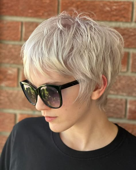 We love a good pixie 🧚🏻‍♀️ Work by @amygodbehair #smokeandhoneysalon #bigrapidssalon #pixiecut | Instagram Short Pixie Blonde Hairstyles, Blond Pixie Haircut, "mixie" Haircut, Wispy Pixie Cut, Silver Pixie Haircut, Pixie Cut With Fringe, Shag Pixie Cut, Platinový Blond, Ash Blonde Pixie