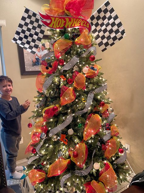 Small Boy Christmas Tree, Firetruck Christmas Tree, Hot Wheels Tree Christmas, Cars Christmas Tree Disney, Boys Christmas Trees, Cars Theme Christmas Tree, Monster Truck Christmas Tree Ideas, Little Boy Christmas Tree Ideas, Hot Wheel Christmas Tree